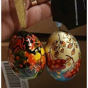 2 wooden hand painted eggs Souvenier Boutique